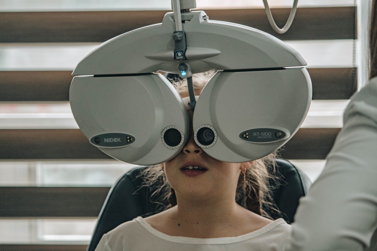 An eye examination room with modern diagnostic equipment at Aneeja Hospital